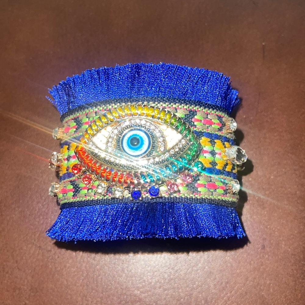 Evil eye blue fringed cuff bracelet
